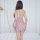 Woman wearing sheer purple lace chemise with heart pattern, bodycon fit mini dress sleepwear from back view.