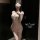Woman wearing a sheer pink lingerie set with lace details and blindfold, featuring the pure & playful lingerie set – minimali...