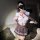 Woman wearing pure & playful lingerie set — seductive jk-style sleepwear with white blouse, plaid skirt, and red rope detaili...