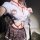 Woman wearing pure & playful lingerie set — seductive jk-style sleepwear with white tied shirt, plaid skirt, and red rope acc...