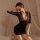 Woman in black lace top and bodycon skirt, posing seductively with hand over eyes — pure & playful lingerie set.
