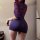A woman models the pure & playful lingerie set, featuring a seductive secretary costume with a sexy sleepwear design, perfect...