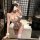 Woman modeling pure & playful lingerie set – seductive white lace outfit with cat ears, perfect for intimate moments.