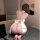 Woman wearing pure & playful lingerie set – sheer chef-style top with open-crotch design, tied back bow, and seductive silhou...