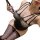 Woman wearing black sheer mesh lingerie set with strappy design and sparkling details, holding a whip.