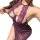 Woman wearing purple lace lingerie set with sheer open-crotch skirt, featuring delicate floral patterns and a halter neckline...