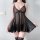 Woman wearing black lace pure & playful lingerie set - seductive strap bodysuit with sheer overlay, elegant yet naughty wea...