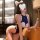 Woman wearing pure & playful lingerie set with cat ears, posing seductively on couch while holding phone — sensual no-remove ...
