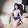Woman modeling pure & playful lingerie set — sheer babydoll chemise with matching thong, no-remove design, on sofa.