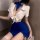 Woman in white sheer top with blue bow and matching skirt, styled as pure & playful lingerie sleep set for romantic nights.
