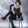 A stylish model showcases the pure & playful lingerie set, featuring a sparkling sheer mesh bodysuit with cutout straps and m...