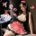 A stylish maid costume featuring a cute plaid skirt, playful design, and adorable bow headband, perfect for role play.