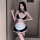 Woman wearing black and white pure & playful maid costume set with lace trim, bow choker, apron, and thigh-highs — sexy cute ...