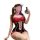 Woman in red and black sheer lingerie bodysuit with lace trim, posing playfully while holding a phone.