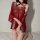 A woman models a luxurious red chinese-inspired lingerie set, featuring sheer mesh sleep dress with intricate embroidery and ...