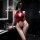 Woman in red lace bodysuit with cutouts, posing in modern bathroom. pure & seductive lace bodysuit set - sexy sleepwear for w...