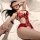 Woman in red lace bodysuit with sheer panels and bow details, lying on white bed.