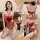 Woman modeling red floral lingerie bodysuit with tie details, front and back views, on plush rug beside leather sofa.