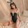 Woman in black maid-style lingerie set with bunny ears, sitting on bed. pure & seductive lingerie set - modest yet sexy maid ...