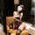 Woman in black pure & seductive lingerie set, modest yet sexy q-qny style sleepwear with sheer bodysuit and lace stockings.