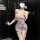 A woman models a revealing, floral-patterned dress with a plunging neckline and thigh-high slit, embodying elegance and allur...