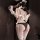 Woman wearing pure & seductive bunny girl lingerie set with open-crotch design, lace gloves, and thigh-high stockings.