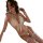 Woman wearing white feathered lingerie set with garter stockings and cat ears, perfect for cosplay or intimate nights.