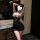 Woman in black lace lingerie set, posing with arms raised. pure & seductive lingerie set - sexy sleepwear for women.