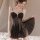 Woman wearing black sheer lace mesh slip-on lingerie with floral details, elegant and seductive design for small bust.