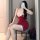 Woman wearing red lace bodysuit with white trim, sitting on chair. pure & sexy lace bodysuit for women - trendy sheer mesh sl...