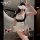 A woman poses with a wine glass, wearing a white and navy sailor uniform-style lingerie set featuring a soft skirt and lace d...