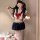 A woman models the pure temptation jk sleepwear set, featuring a sexy sailor uniform short skirt outfit. the kawaii schoolgir...