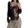 Woman wearing black lace bodysuit with sheer panels, holding wine glass, styled for romantic bedroom wear.