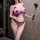 Woman wearing purple cat lingerie set with sheer fishnet stockings, open-crotch design, and cut-out bust featuring pearl acce...