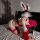 Sexy holiday outfit featuring a bunny girl costume with red and white colors, lace details, and a rear cutout design. perfect...