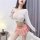 A stylish jk uniform set featuring a plaid pleated skirt paired with a crop sweater, perfect for cosplay, roleplay, and adult...
