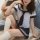 A stylish sailor-themed schoolgirl outfit featuring a white top with navy accents, a bow tie, and a matching skirt with strip...
