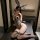Woman wearing pure & tempting leopard print lingerie set with bunny ears, featuring open-crotch design and sheer mesh panels ...