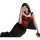 A woman poses with a smartphone, wearing a red lace bodysuit featuring a push-up corset design and a black skirt. the set inc...