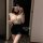 Woman in pure & tempting lingerie set, modest secretary style bodycon skirt sleepwear with lace mask and pearl necklace.
