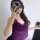 Woman in purple lace bodysuit skirt sleepwear, modest yet sexy design, perfect for a tempting night.