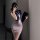 Woman in stylish secretary skirt and top, holding folder and phone, showcasing pure & tempting lingerie set for a chic, allur...