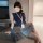 Woman in navy top and gray skirt with laptop, wearing pure & tempting lingerie set - secretary skirt, air hostess costume.