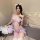 Woman wearing sheer purple lace lingerie set with cat ears, featuring a no-remove design for sensual cosplay sleepwear.