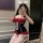 A woman poses with cat ears, wearing a red and black sheer bodysuit featuring lace details and an open crotch design, perfect...