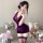 Woman modeling purple lace bodysuit skirt set, seductive no-remove lingerie sleepwear outfit with floral hair accessory and p...
