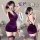 Model wearing purple lace bodysuit skirt set with thigh-high stockings, back view shown in mirror.