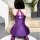 Woman wearing a purple lace bodysuit with a seamless thong design, featuring a busty-looking silhouette and no-remove lingeri...