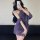 A woman poses in a purple lace cheongsam dress, featuring a halter neck design and flowing shawl, perfect for a flirty party ...