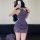 A woman poses in a purple lace cheongsam dress, featuring a halter neck design and intricate detailing. the bodycon silhouett...